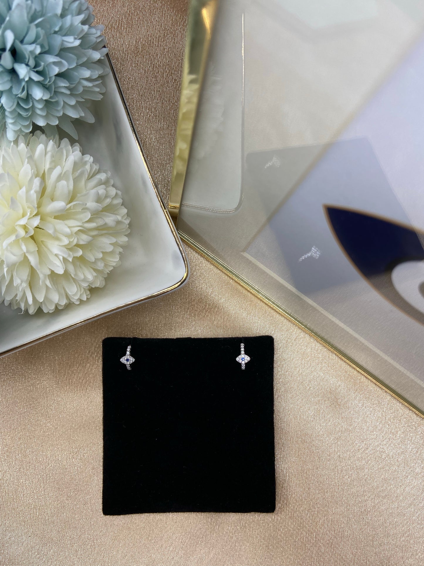 Encrusted Evil Eye Huggie Earrings